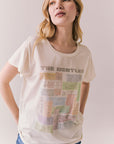 Front view of The Beatles Ticket Stub Collage Tee in Starry White with vintage ticket graphic and classic band logo against a plain background