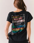 Black vintage-style graphic tee with Journey tape deck artwork and relaxed fit.