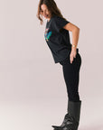 Black vintage-style graphic tee with Journey tape deck artwork and relaxed fit.