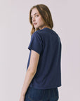Back view of the Chaser Merci Heart Tee showing a clean solid back with relaxed silhouette