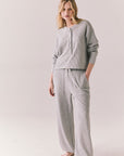 Full front view of Thayne cropped thermal henley top in Heather Grey with 3/4 button placket and ribbed texture and matching Billy Joggers against a plain background