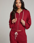 Front view of model wearing Abilenee Blood Red Zip Up Hoodie with cropped hem and full-zip closure against a plain background