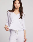 Front view of model wearing 3/4 Sleeve Split Side Light Heather Grey Dolman Hoodie with dolman sleeves and split-side hem on plain background with matching joggers