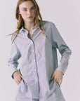 Chaser Paso Pinstripe Button Up in Navy shown from angled front highlighting fluid lightweight fabric and easy drape