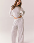 Heather grey ribbed long sleeve top with thumb holes and fitted shape.