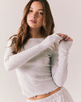Heather grey ribbed long sleeve top with thumb holes and fitted shape.