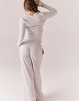 Heather grey ribbed long sleeve top with thumb holes and fitted shape.
