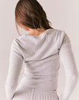 Heather grey ribbed long sleeve top with thumb holes and fitted shape.