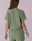 Back view of the Chaser Cheyenne Meadow Green Pullover highlighting the raglan sleeves and soft lounge shape