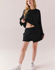 Black drawstring lounge shorts made from soft pillow terry.