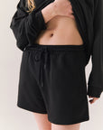 Black drawstring lounge shorts made from soft pillow terry.