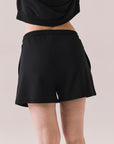 Black drawstring lounge shorts made from soft pillow terry.