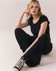 True black fleece joggers with side pockets and relaxed silhouette.