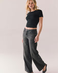 True black cropped tee with ruched side seams and high neck design.