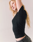 True black cropped tee with ruched side seams and high neck design.