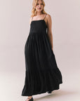 Side full body view of model in Berkeley Maxi Dress in true black