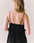 Back view of model wearing Berkeley Maxi Dress in true black