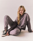 Full body view of model wearing fig Bay fleece joggers