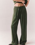 Front view of Lee Trouser in bronze green with wide-leg silhouette and relaxed drape against a plain background