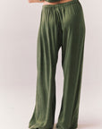 Back view of Lee Trouser in bronze green with wide-leg silhouette and relaxed drape against a plain background