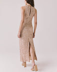 Full body back view of woman wearing Chaser’s Faye Bronze Brown Dress on a white background