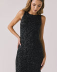 Front view of woman wearing Chaser’s Faye True Black Dress on a white background