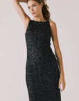 Front view of woman wearing Chaser’s Faye True Black Dress on a white background