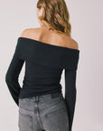 Back view of woman wearing Chaser’s Pixie True Black Long Sleeve on a white background