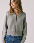 Front view of woman wearing Chaser’s Heather Grey Luck Zip Up Cardigan Sweater on a white background
