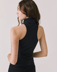 Back view of woman wearing Chaser’s Hailee Black Tank on a white background