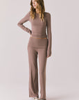Full body view of woman wearing Chaser’s Porta Deep Taupe Long Sleeve top with matching Mantra Deep Taupe Leggings on a white background