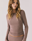 Front view of woman wearing Chaser’s Porta Deep Taupe Long Sleeve top on a white background