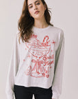 Front view of woman wearing Chaser’s Spirits Bright Light Grey Long Sleeve with red graphics and text on a light gray background