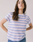 Full body view of woman wearing Chaser’s Cosmo Pink Stripes Tee paired on a white background