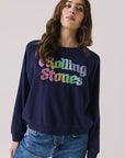 Front view of woman wearing Chaser’s The Rolling Stones US Tour 1978 Long Sleeve in Oxford Blue with tongue logo graphic on a white background