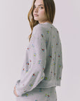 Chaser Terra Heather Grey Ditsy Embroidery Pullover shown over shoulder with relaxed back drape and ribbed trim