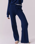 Angled lower body view of the Sailor Worn Blue Joggers highlighting the ribbed fabric and relaxed straight-leg fit