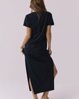 Back view of the Chaser Winslet Maxi Dress in True Black showing a clean solid back and easy drape through the skirt