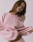 Front view of the Chaser Rhode Pink Salt Pullover featuring a relaxed silhouette and ribbed knit texture