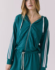 Chaser Abilene Teal Zip-Up Hoodie with White Stripes captured in a close up of the neckline and shoulder stripes