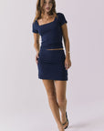 Chaser Rue Navy Skort in Navy styled with matching Jeany Tee featuring a flattering ruched silhouette and soft stretch fit