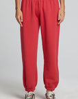 Front view of a woman wearing the Chaser Ada Dry Red Jogger on a neutral background with arms at sides