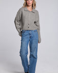 Model wearing Chaser's Winter Heather Grey Fortune Cardigan in Winter Heather Grey cropped button-front knit with pointed collar, full-body view