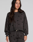 Back view of a woman wearing the Chaser Chaser Allover Mini Stars Long Sleeve and matching pants on a neutral background with arms lowered