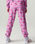 Back view of a girl wearing the Chaser Allover Sweethearts Girls Jogger on a neutral background