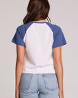 Back view of a woman wearing the Chaser Athletics Club Tee on a neutral background with jeans