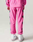 Back view of a girl wearing the Chaser Big Love Girls Jogger on a neutral background