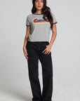 A full body front view of a woman wearing the Chaser California Dreamin Tee on a neutral background