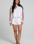 A full body front view of a woman wearing the Chaser Kloud Cloud White Sweatshirt Set on a neutral background