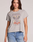 Front view of a woman wearing the Chaser Live Music Graphic Tee on a neutral background